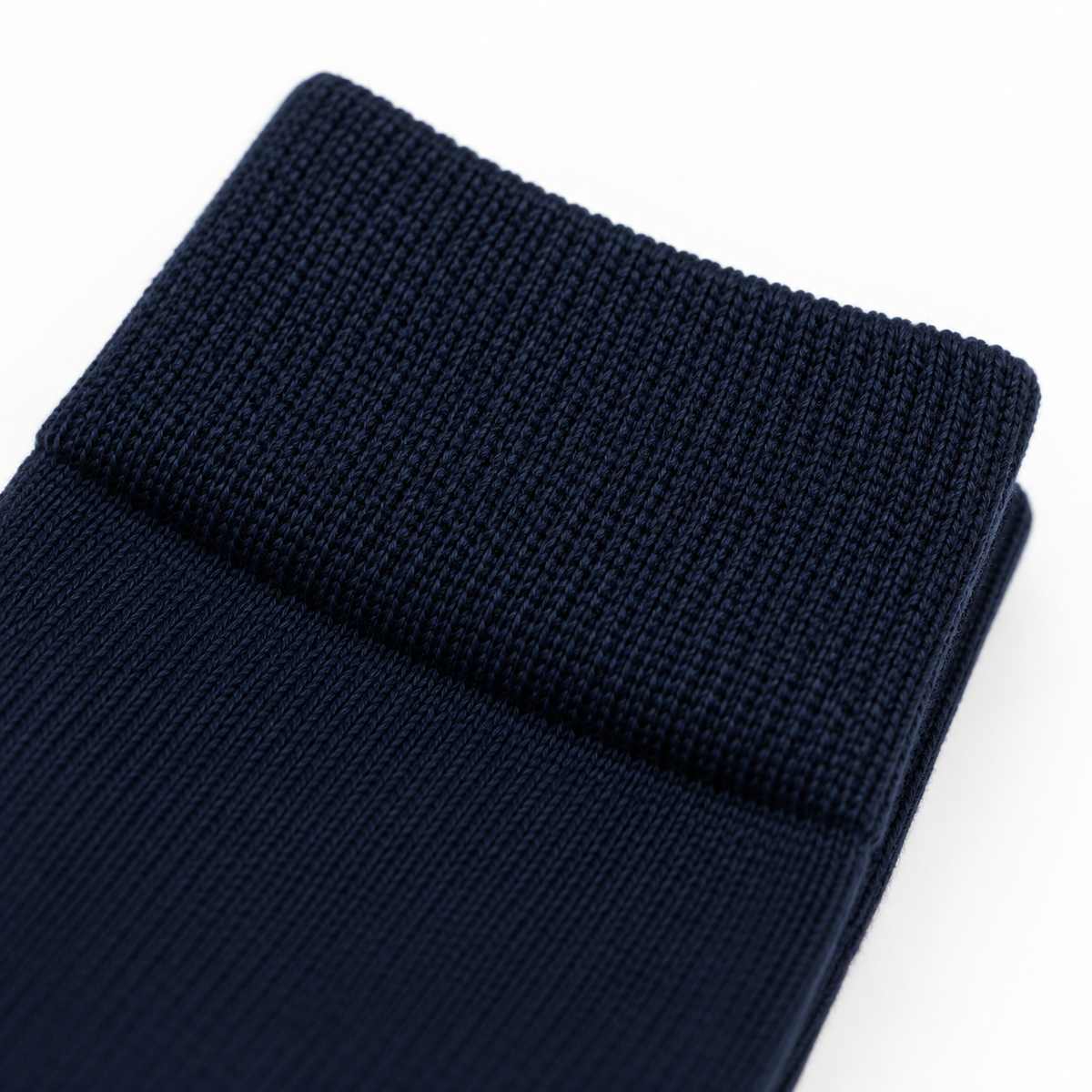 Close-up of the ribbed cuff on a Midnight navy business sock