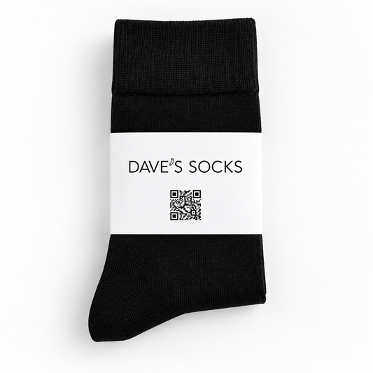 Onyx black business socks with Dave's Socks paper band