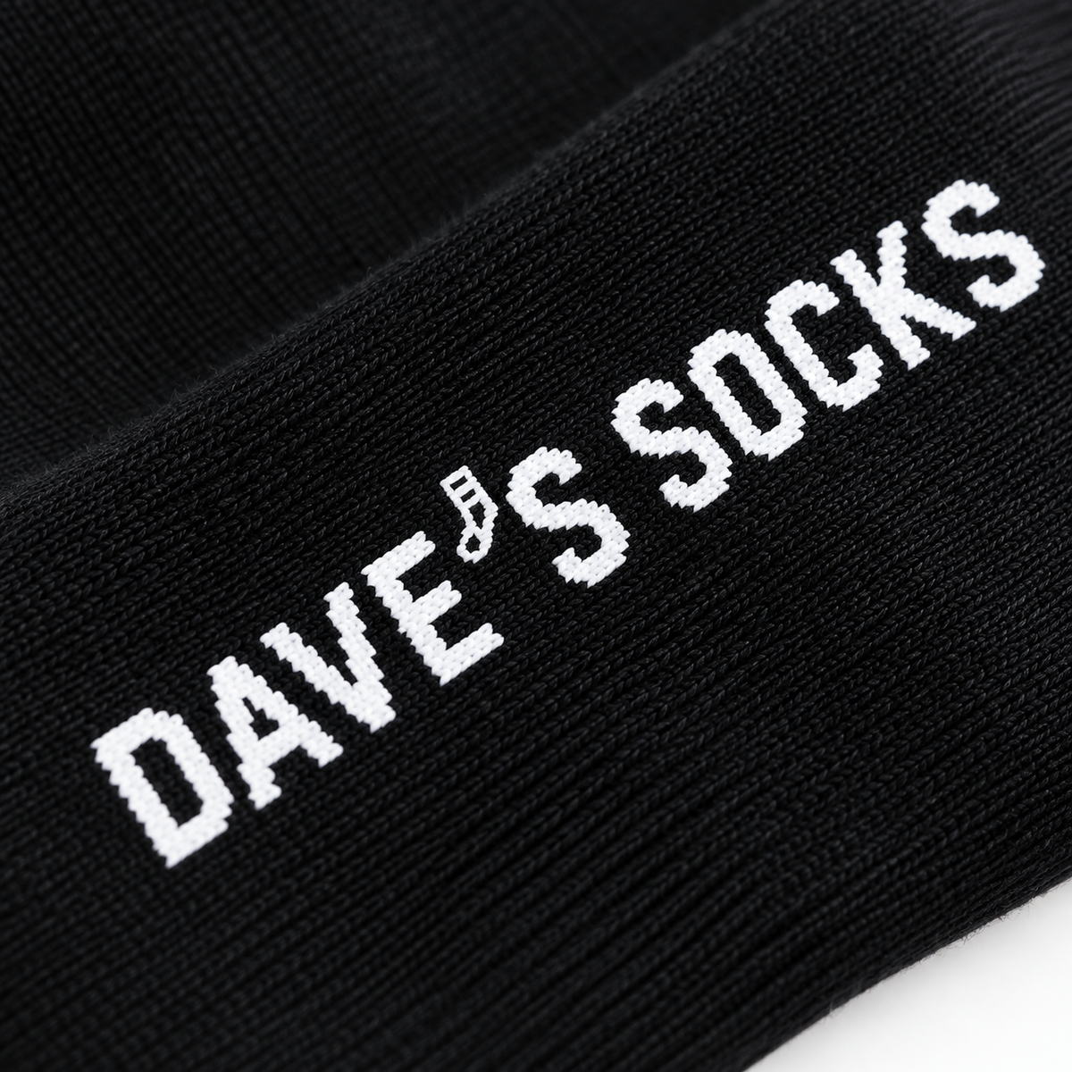 Dave's Socks logo on an Onyx black business sock